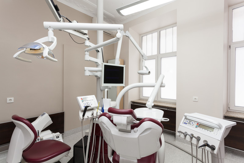 Modern dental chair in a clean clinic setting, prepared for a dental implant consultation and procedure in Austin, TX.